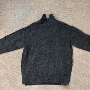 Woman’s Turtle Neck Grey Sweater